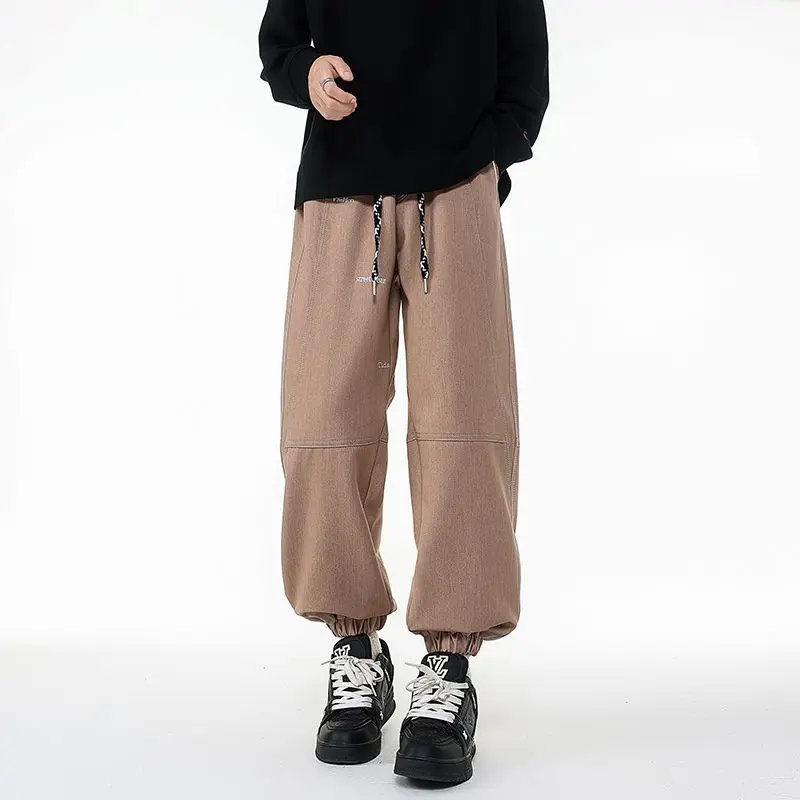 Pantaloni da uomo stile retrò taglie forti versatili per la primavera e l'autunno pantaloni allacciati alla caviglia pantaloni da lavoro casual larghi e dimagranti