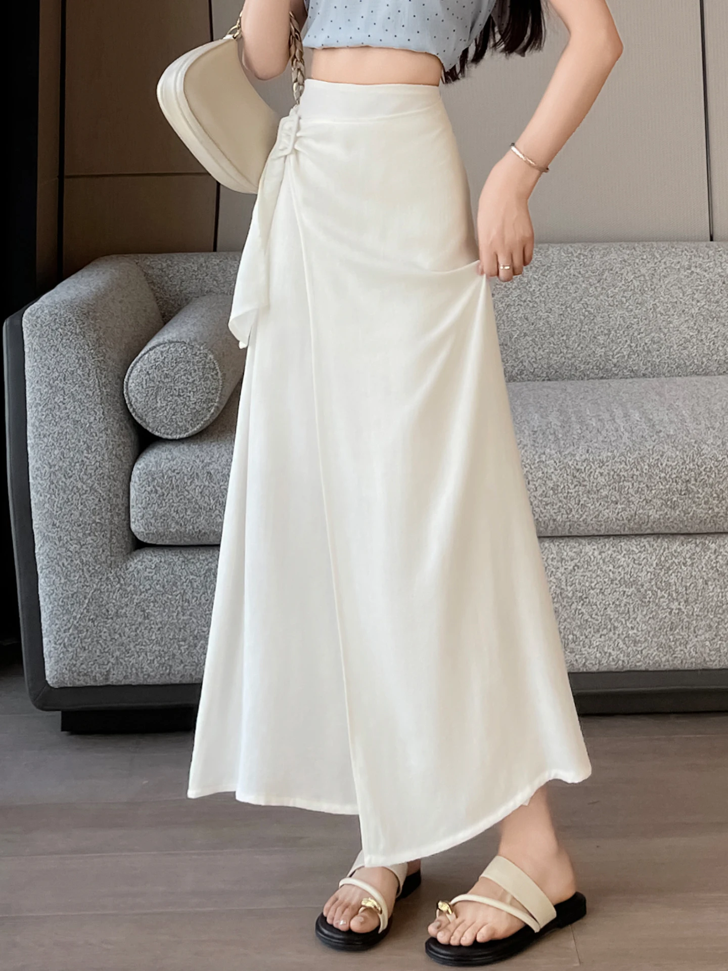 

Льняная юбка А-силуэта с высокой талией, женская летняя модель, стройнящая длинная асимметричная юбка-полусолнце в корейском стиле для повседневной носки