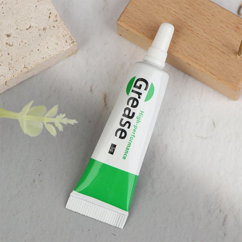 

Водостойкая силиконовая литиевая смазка-высоковольтная изоляционная смазка для автомобильных свечей зажигания, подшипников и морских тормозных систем