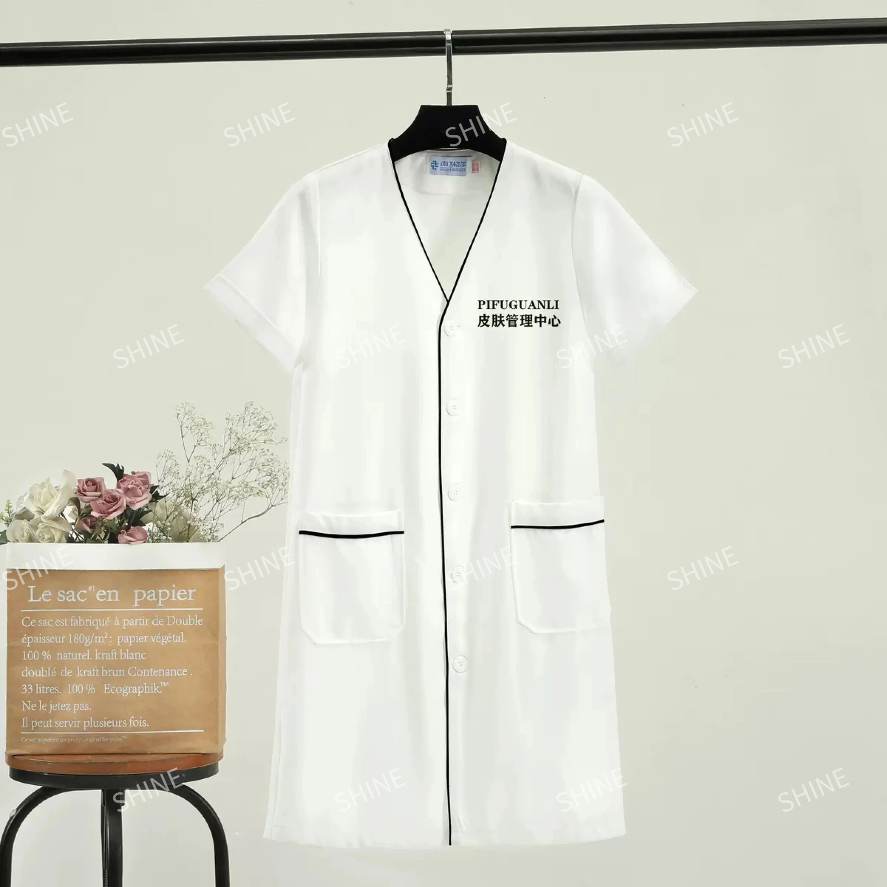 Zwarte korte schoonheidsspecialiste tops schoonheid uniform jurk spa uniform scrub uniform wit plus size Salon verzorgingskleding Laboratoriumjas logo