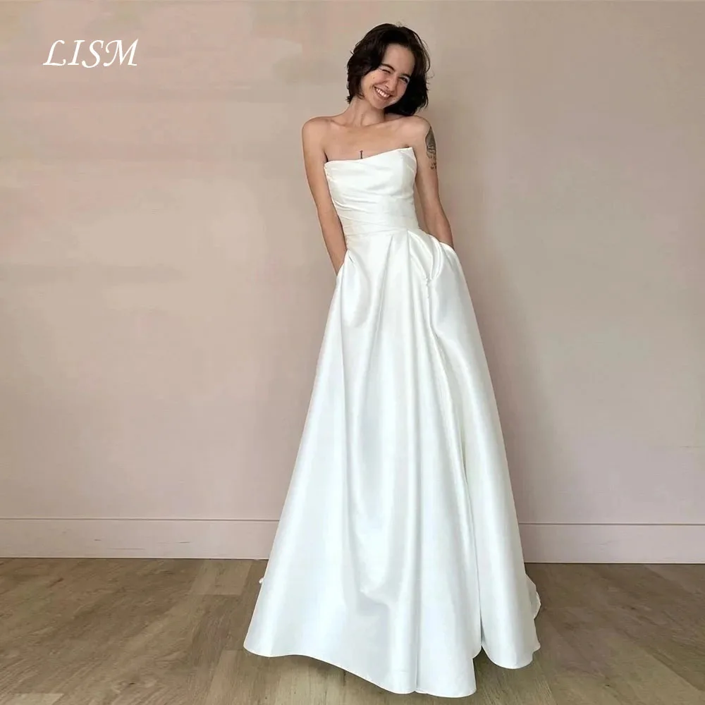 LISM Elegante gedrapeerde satijnen trouwjurken Mouwloze bruidjurk Ruglooze op maat gemaakte vloerlengte Ruglooze Robe de huwelijk