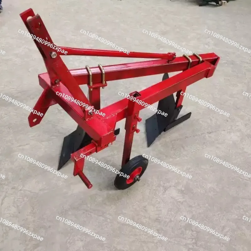 Agricultural small four-wheel horsepower tractor with hanging cultivated land plow and double plow