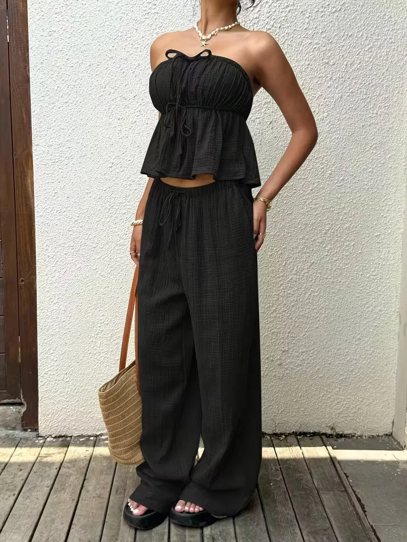 2ピースセットの女性用衣装、新しい女性用カジュアルツーピース、レースアップトップとパンツ