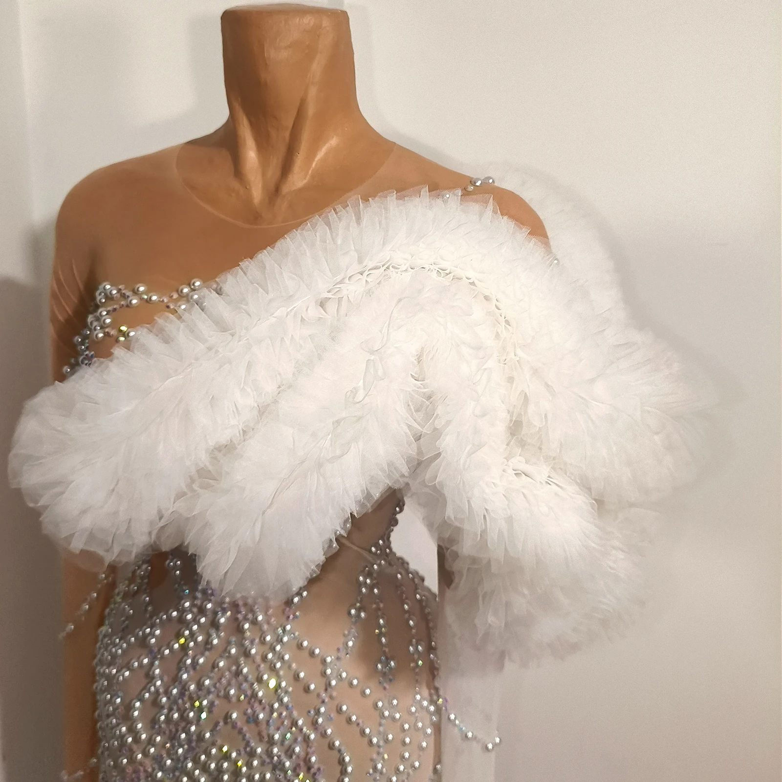 

Elegant lady's white pearl see-through transparent dress for birthday parties, dinners, and club stages