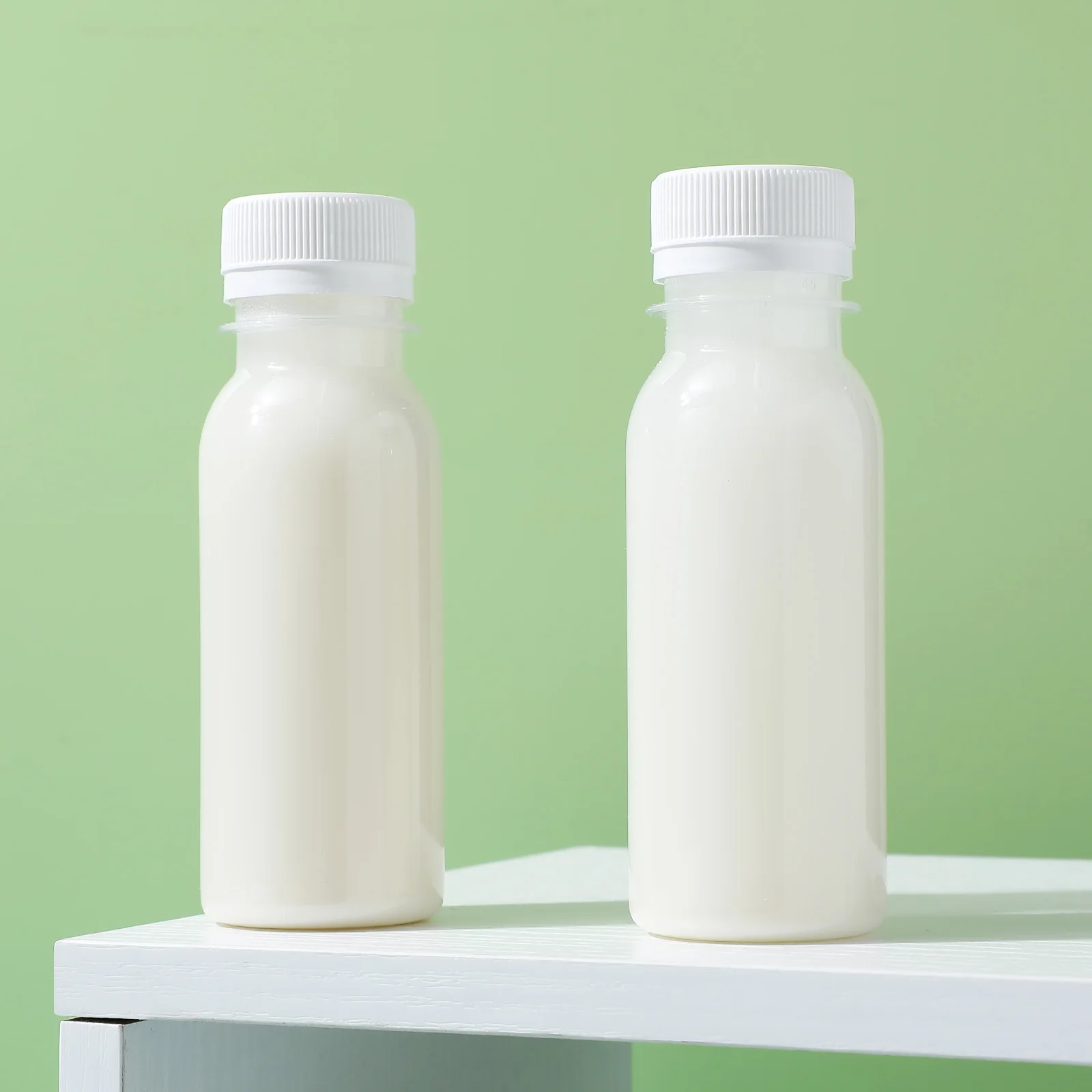 

20pcs Small Juice Bottles Clear Reusable Pet Material Leak-Proof Lid For Milk Drinks Yogurt Storage Portable Transparent