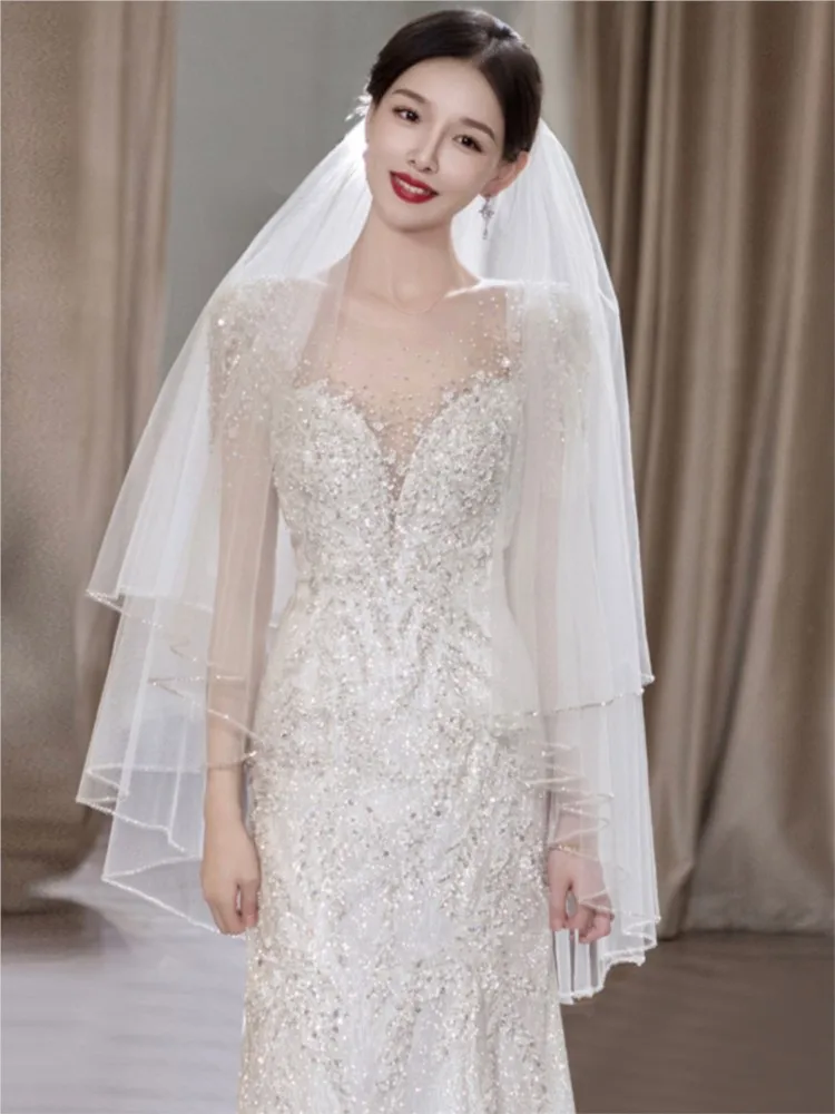 Nowa sukienka szyfonowa na jedno ramię, bardzo ciężka, w stylu lekkiego luksusu z trenem typu rybka.