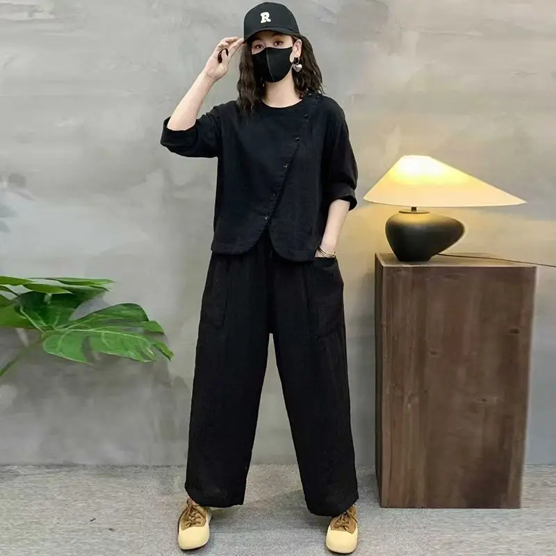 ชุดเซ็ตสองชิ้นสไตล์จีนสำหรับผู้หญิง ฤดูใบไม้ร่วงปี 2025 เสื้อแขนเจ็ดส่วนแฟชั่นลำลอง กางเกงฮาเร็มทรงหลวม