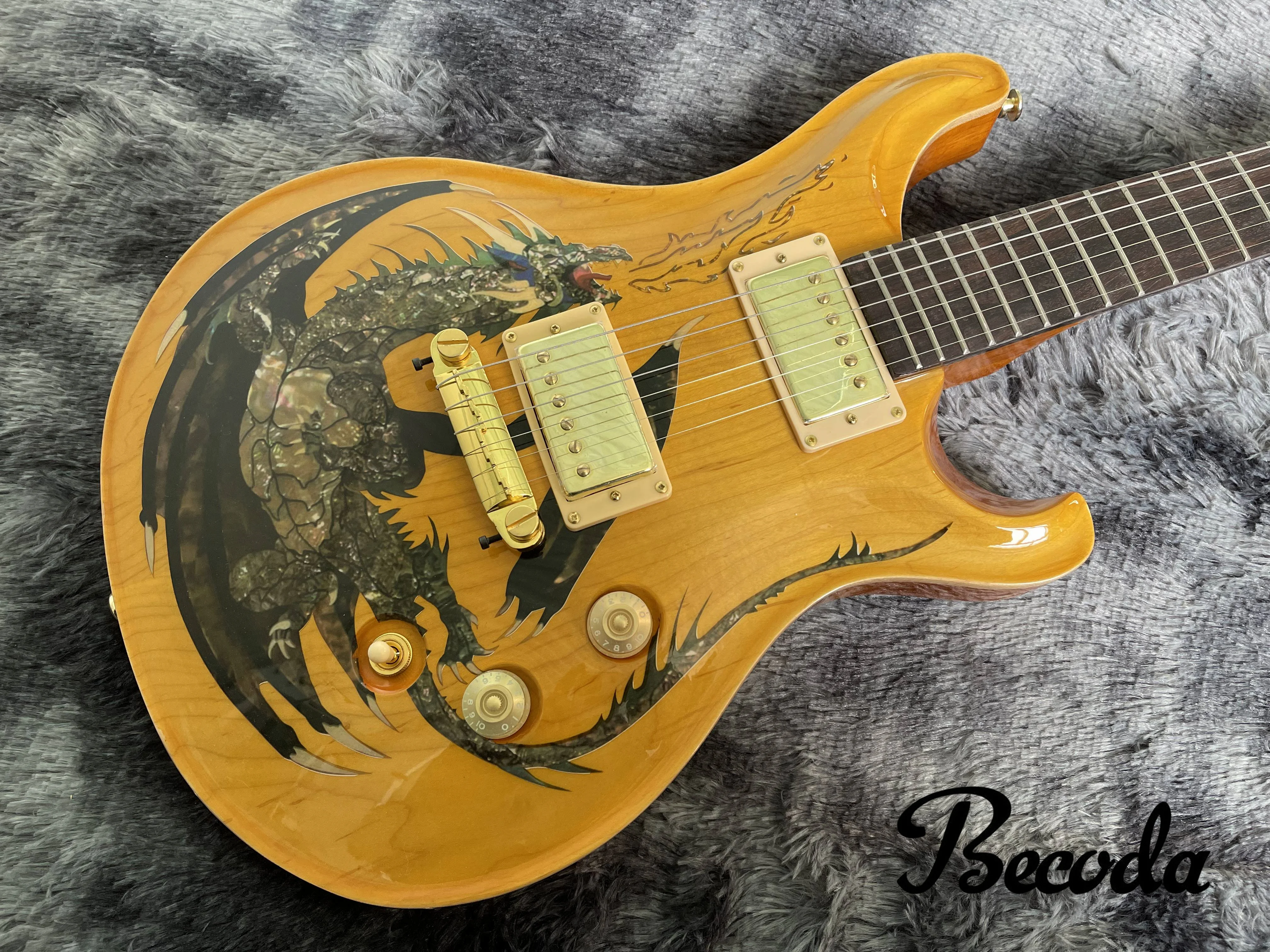 China Becoda OEM  Electric Guitar PR sguitar Dragon body maple top, in stock.