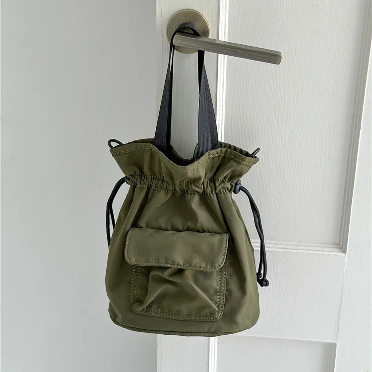 

New drawstring pleated crossbody bag Korean niche student shoulder bag casual nylon small tote bag