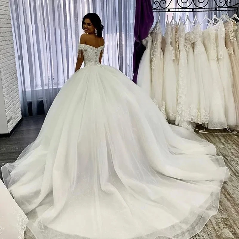 Stunning Crystals Beaded Ball Gown Wedding Dresses Sexy Off Shoulder Cap Sleeve Bridal Gown Puffy Corset Back Vestidos De Novia 