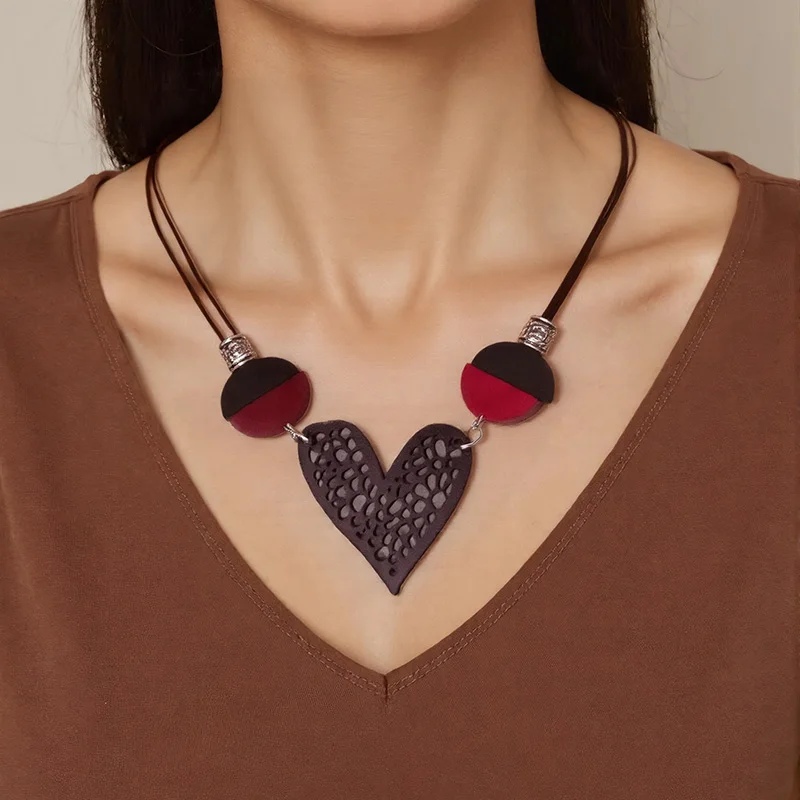 

Women's Boho PU Leather Heart Pendant Necklace Vintage Unique Wood Bead Statement Necklace for Women Daily Wear