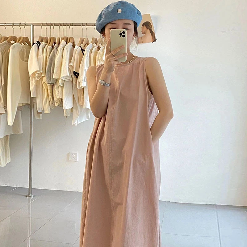 เสื้อกั๊กทรงหลวมสไตล์เกาหลีสีชมพูพาสเทล ดีไซน์เก๋ไก๋ พร้อมกระโปรงทรงเอ สไตล์ลำลอง ผ่าข้าง เหมาะสำหรับฤดูร้อน