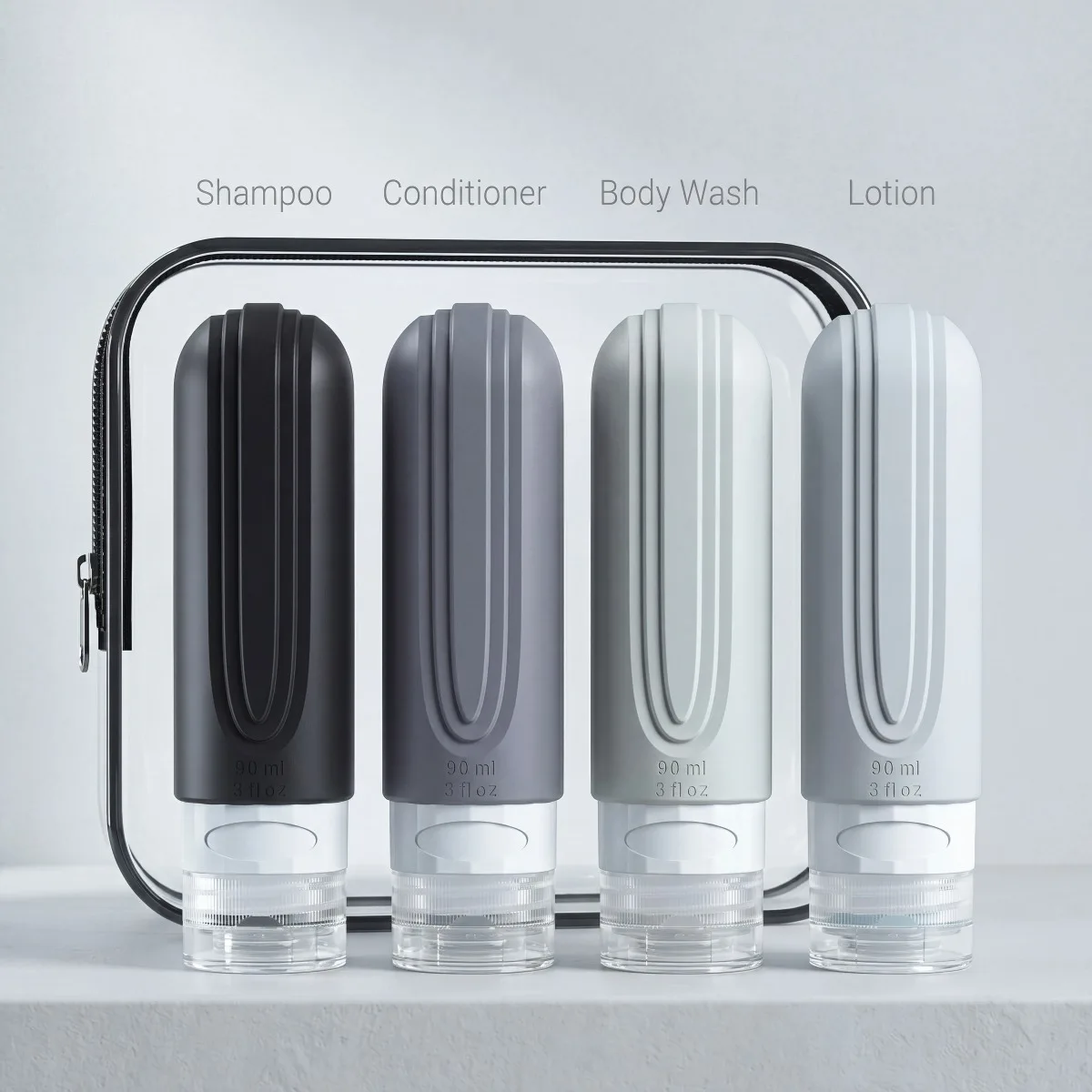 4-piece TSA-approved silicone bottle set (3oz), leakproof & refillable. Includes spray bottle & soap dispenser. Perfect for travel, bathroom & gifting