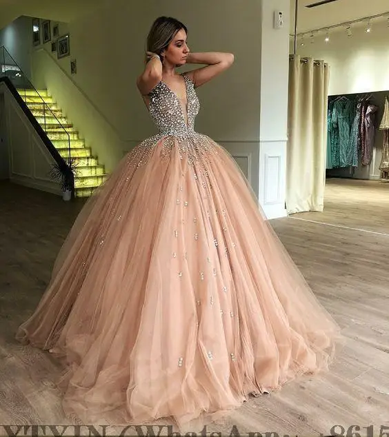 

Ball Gown Gold Quinceanera Dresses Puffy Tulle Prom Dresses V Neck Sweet 15 Year Old princess gown