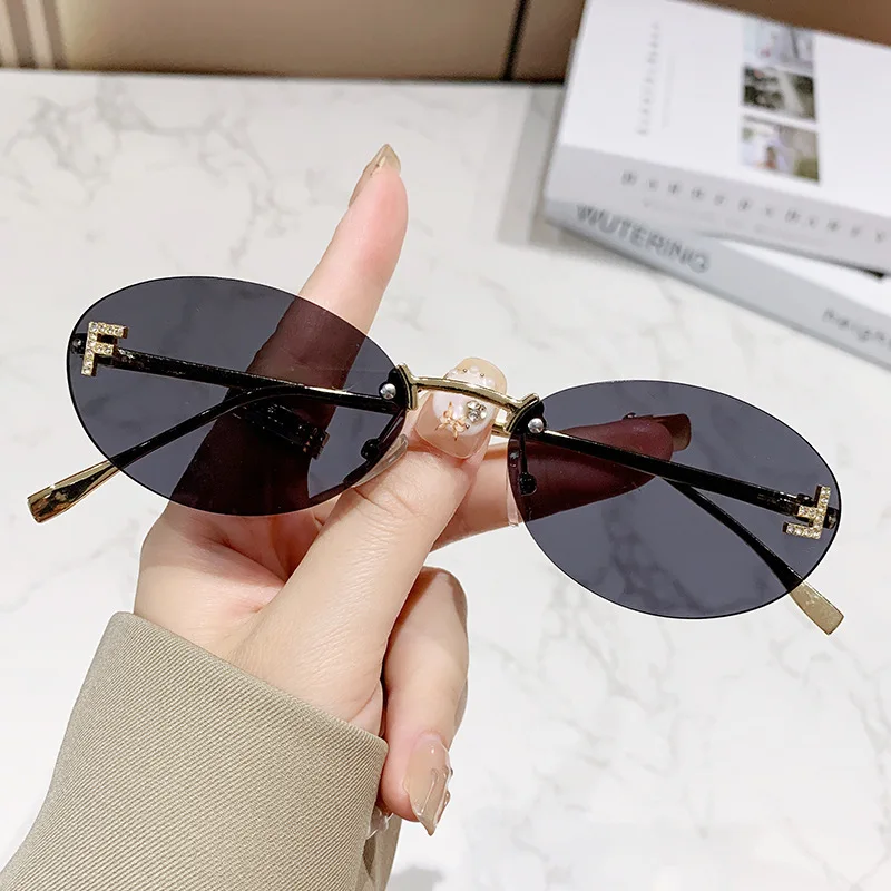 

Fashion Retro Oval Rimless Sunglasses for Women Diamond Letter F Small Frame Sun Glasses Men Outdoor Driving Shades Eyewear