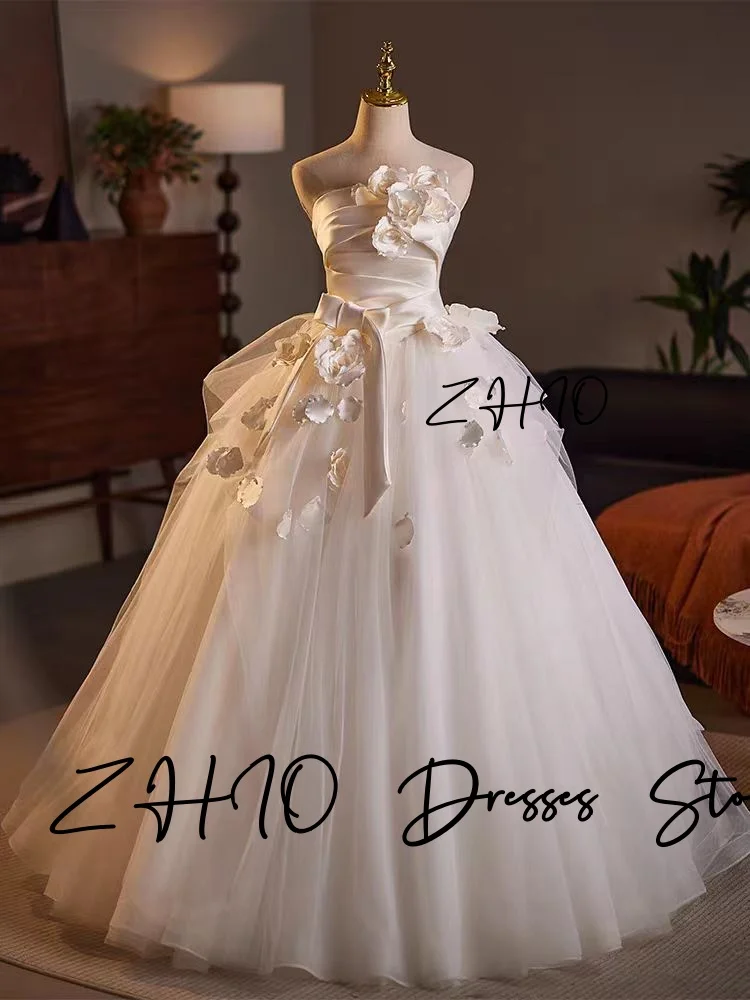 ZHIO Principessa Fiori 3D Abito da sposa Senza spalline A-Line Lunghezza pavimento Tulle avorio Corea Servizio fotografico Abito da ricevimento nuziale Personalizzato