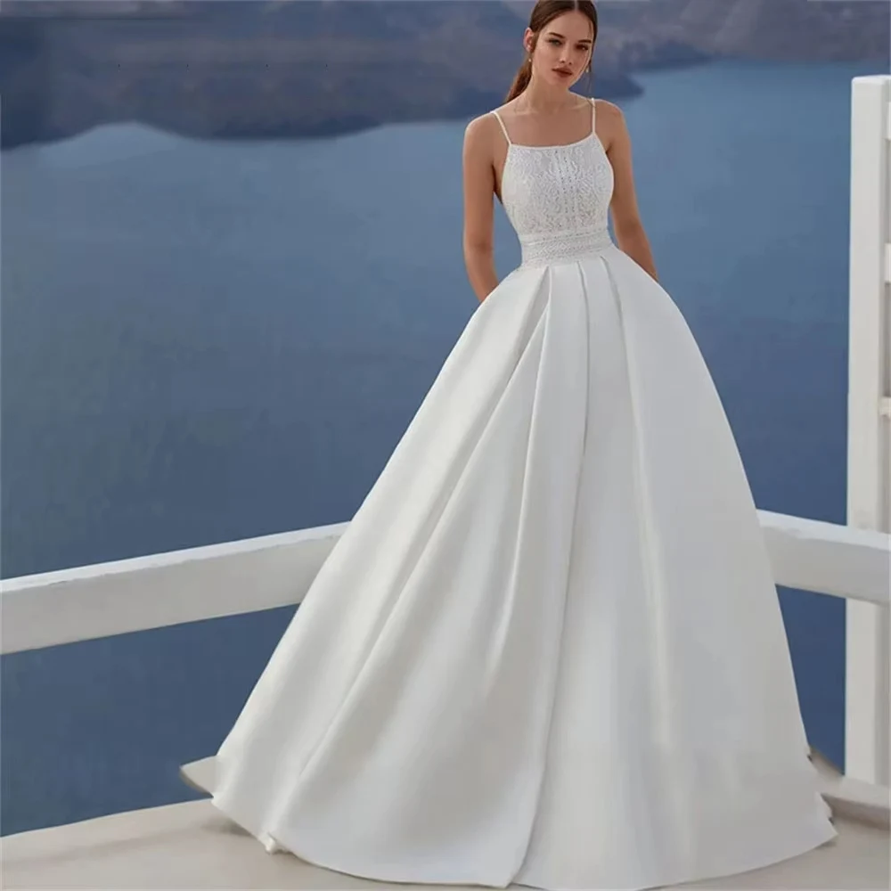 2025 فساتين زفاف نسائية مثيرة على شكل حرف a أنيقة من الساتان بدون أكمام زي العرائس الأميرة مأدبة الكرة رداء De Mariée مخصص