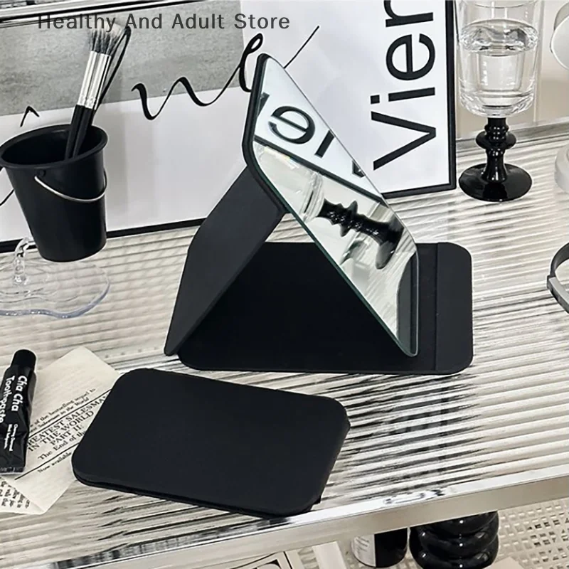 Desktop-Make-up-Spiegel, einfarbig, PU-Leder, einfacher tragbarer schwarzer Handspiegel, faltbar, für Studenten, kompakt, niedlicher Taschenspiegel