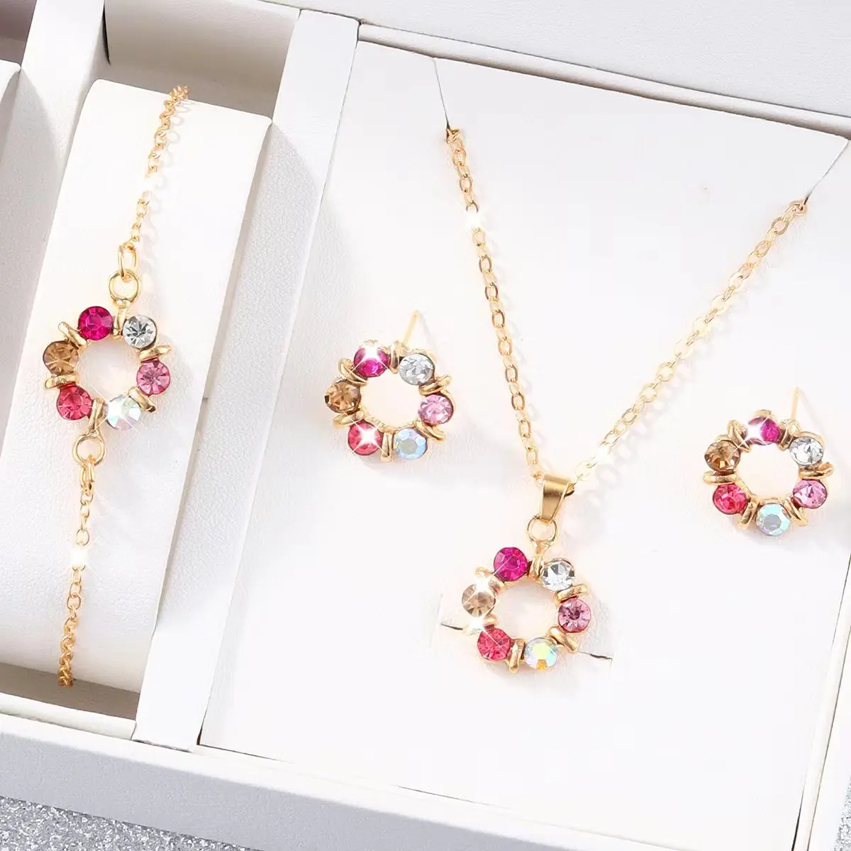

Colorful, fashionable, personalized hollowed-out round pendant necklace, earrings, and bracelet set