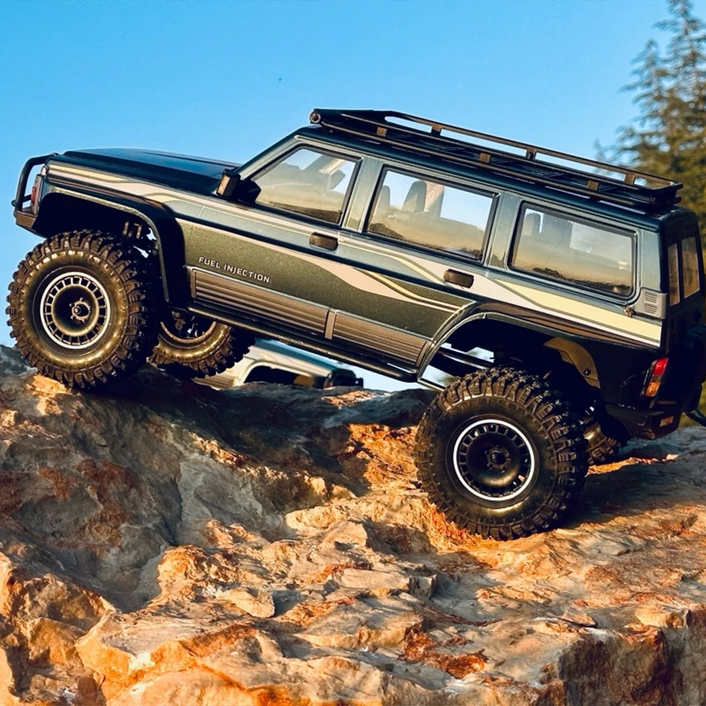 

YK4107 1/10 Легко управляемый радиоуправляемый автомобиль RC Пульт дистанционного управления 4WD Двухскоростной замок дифференциала Альпинистский багги Масштаб 1:10 Реалистичный патруль