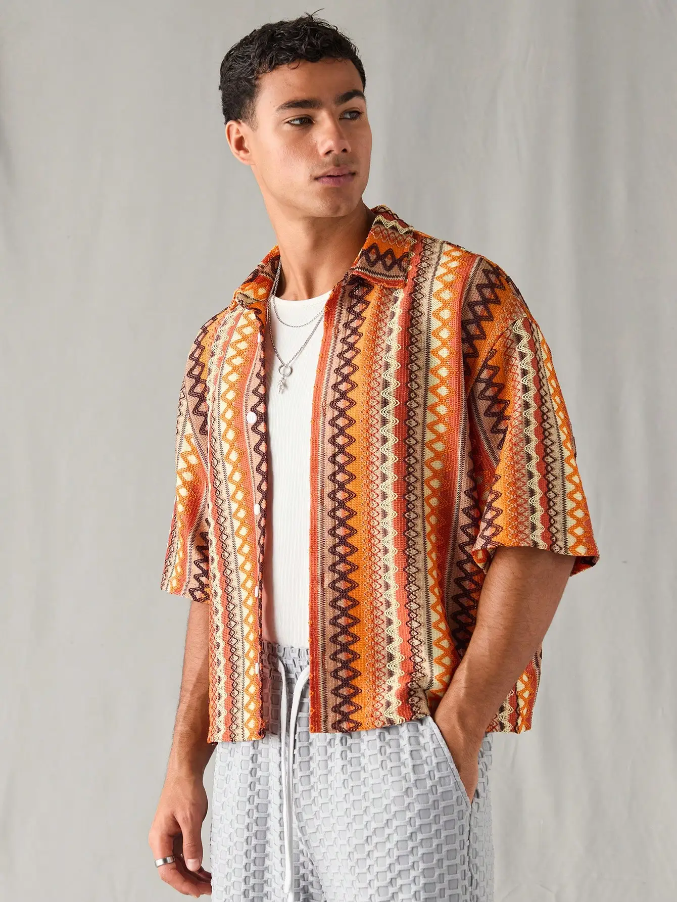 

Men's Knitted Loose Short Sleeve Shirt with Geometric Jacquard Pattern, Casual Wear