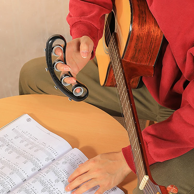 العالمي إصبع المدرب الغيتار موسع الموسيقية إصبع تمديد إصبع قوة البيانو تمتد ممارسة البلاستيك الصوتية موسع