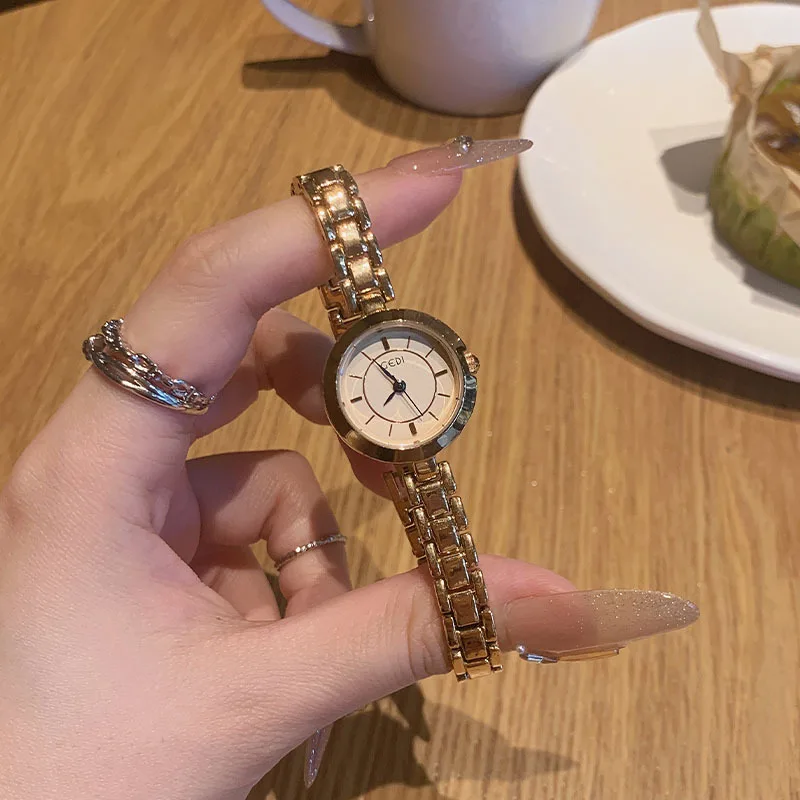 Fashion student trendquartz watch simple water release elegant light luxury niche steel belt women's watch new2025 birthday gift