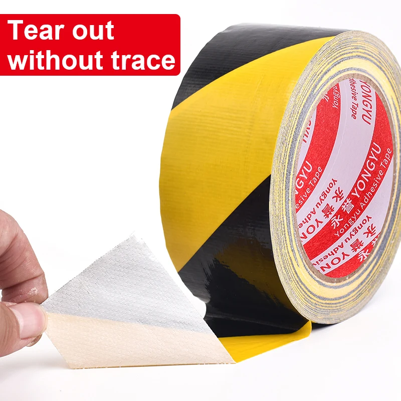 Black and yellow hazard safety warning stripe barrier tape, suitable for marking floors, walls, pipes, and equipment