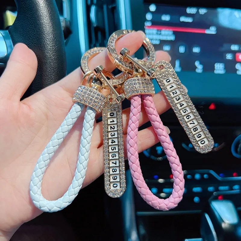 Creative and fashionable car keychain, leather handmade woven rope, full of diamonds, number plate, anti loss keychain ring