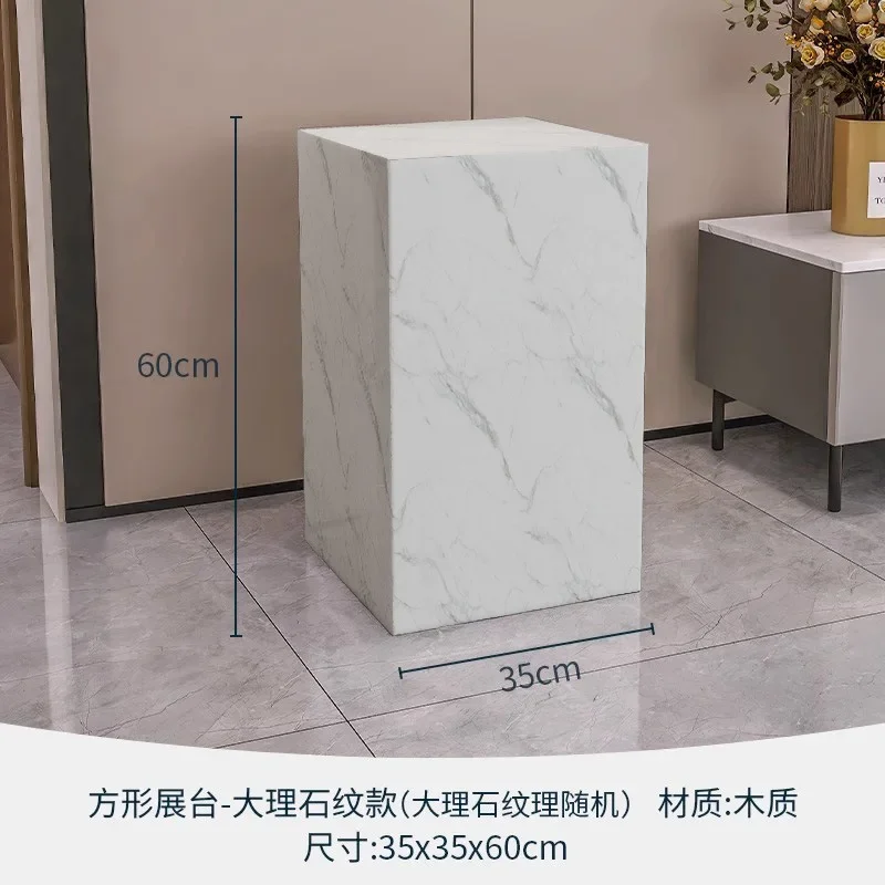 TAO Clothing store floor-to-ceiling white simple window display commodity rack