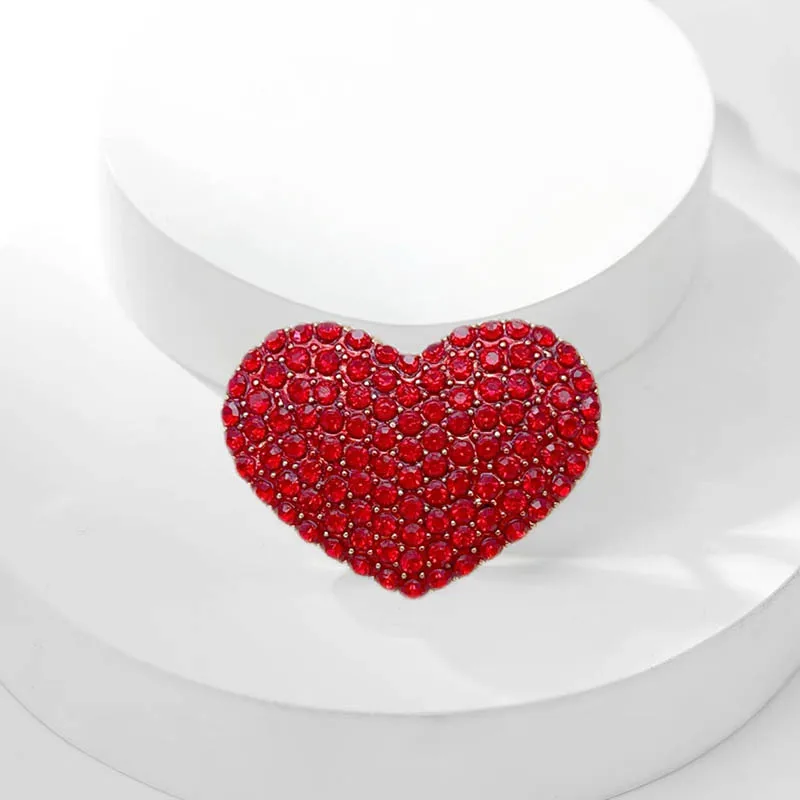 

A high-end, diamond-encrusted red heart-shaped brooch for women, with a retro and niche style