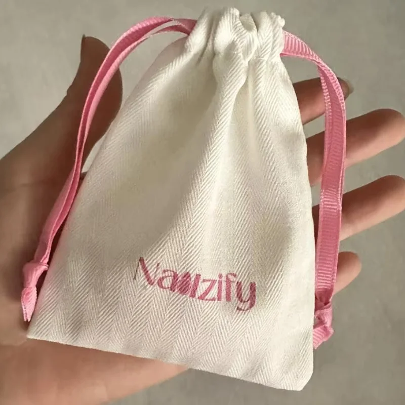 Luxury Herringbone Canvas Drawstring bag with logo print custom pink ribbon for jewelry makeup packaging Dust Sack