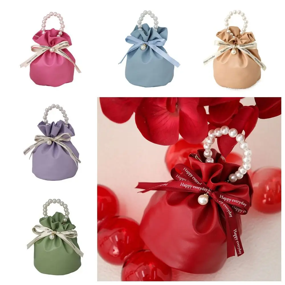 

Solid Color PU Drawstring Bag Storage Bag Korean Style Festive Sugar Bag Bucket Bag Jewelry Packing Bag Pearls Handle Wrist Bag
