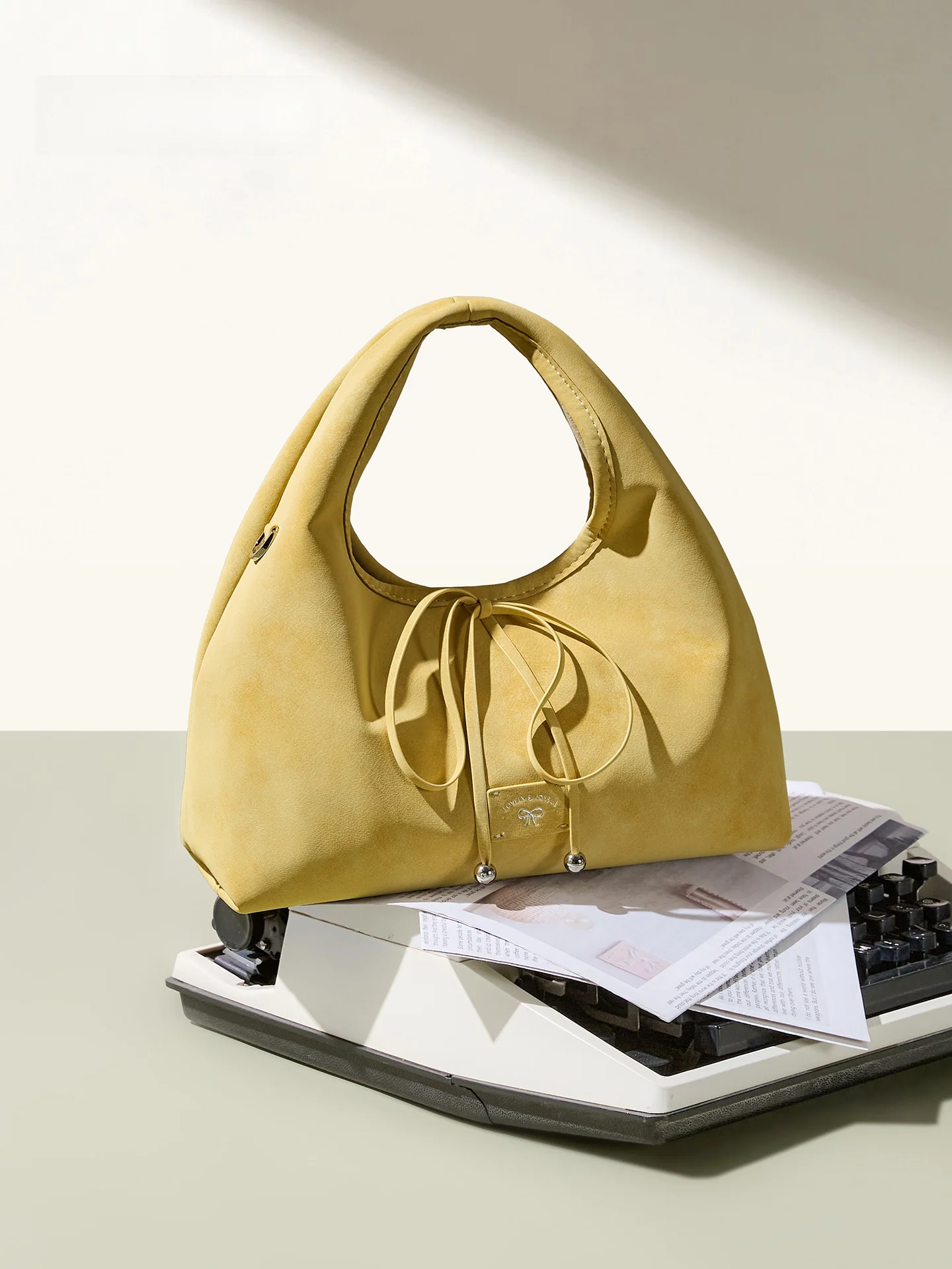 nouveau-sac-a-main-decontracte-et-simple-pour-femme-sac-bandouliere-croise-sous-le-bras-modele-nœud-collection-printemps-2026