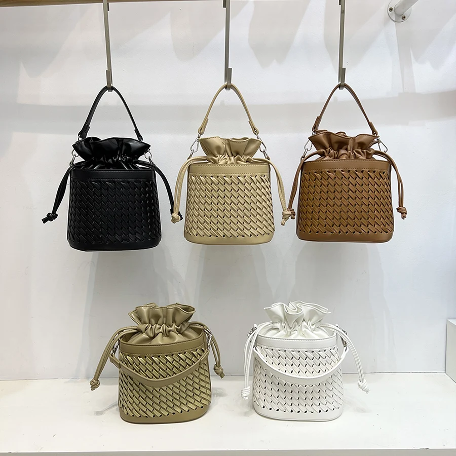 Summer Korea new fashion drawstring bucket bag woven hollow out ladies shoulder crossbody bag female pu leather purse handbags