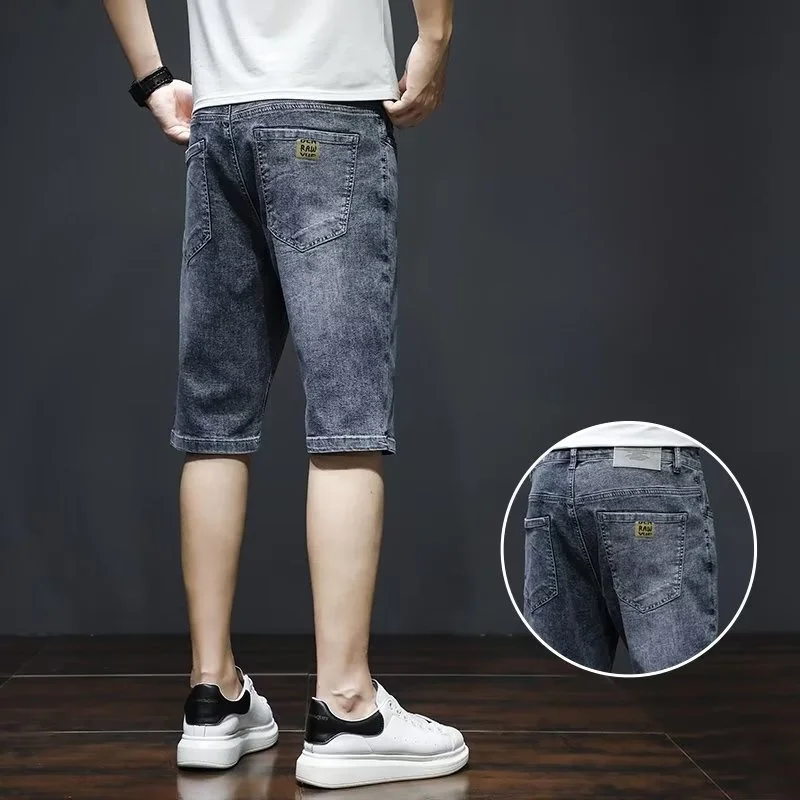 

Мужские летние тонкие повседневные джинсовые шорты-бермуды свободного кроя с высокой талией на молнии, модные, молодежные, популярные, из хлопка, с микроэластаном
