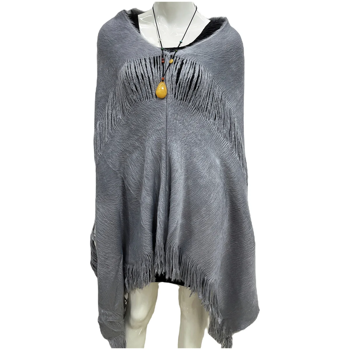 

Autumn and winter warm pull-over European and American new style loose-fitting knitted Cape hollow-out fringed cloak