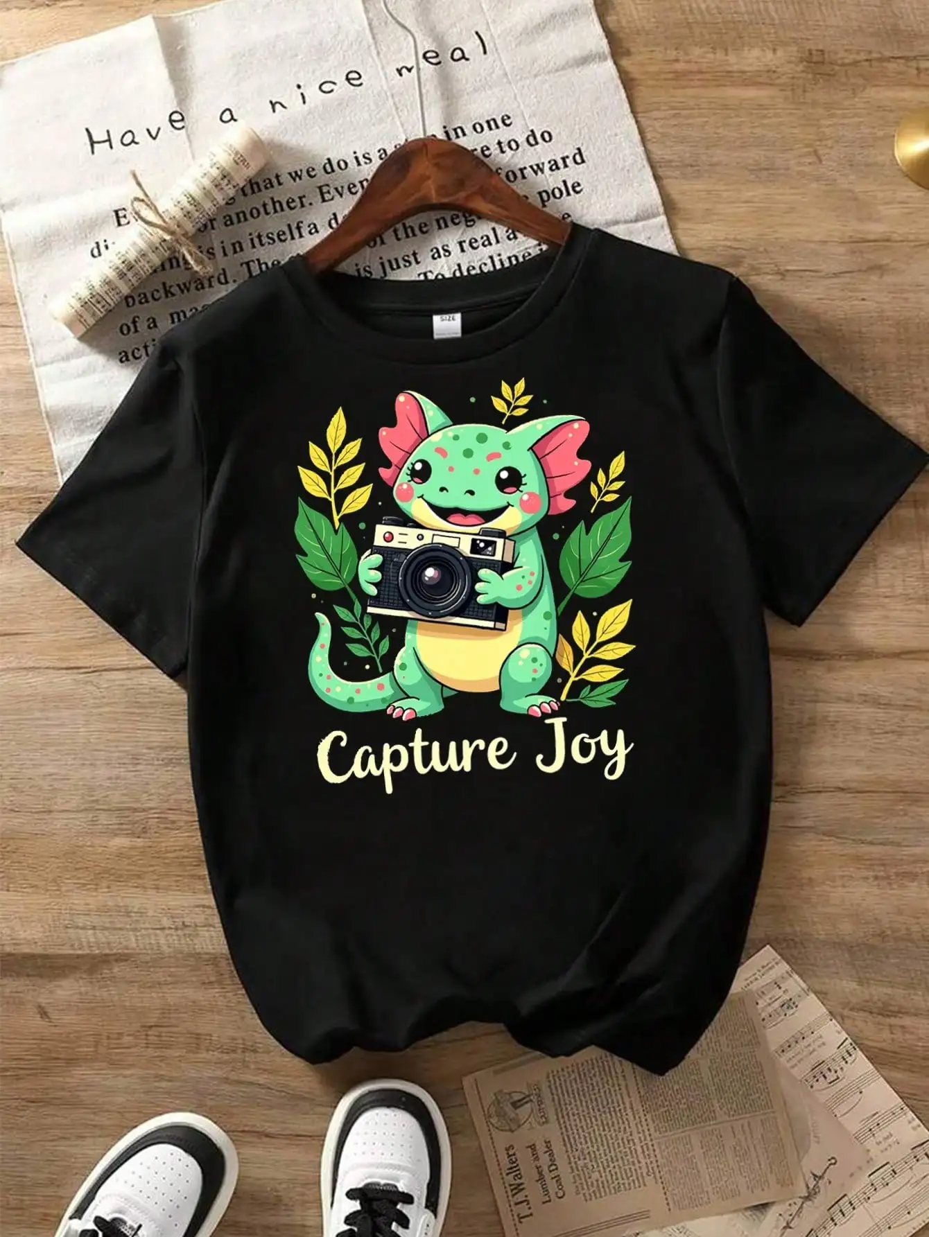 

Cute Mexican Axolotl Cartoon Creature Cotton T-Shirt, Black Tee With Cute Axolotl And Camera