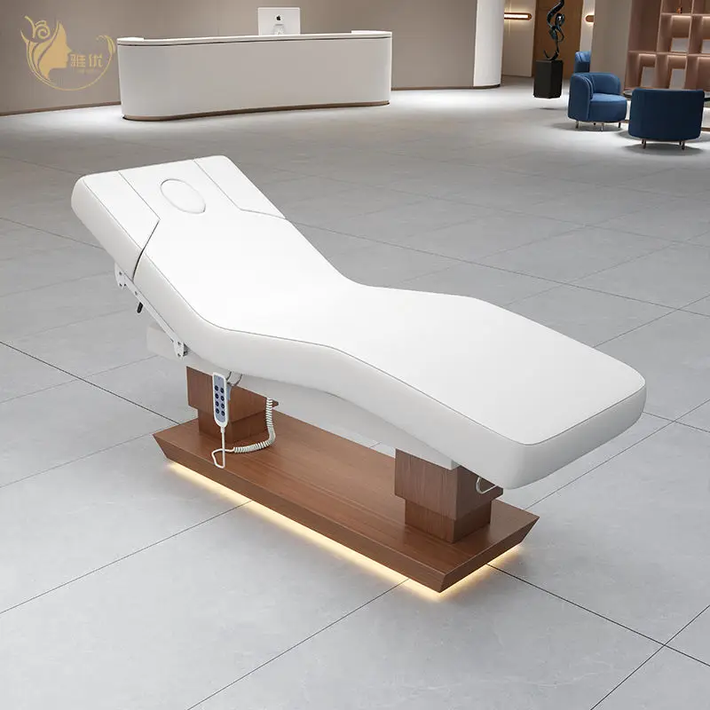 Electric 4-Motor Adjustable Spa Massage Bed With PU Leather Upholstery And Metal Wood Grain Base For Salon Facial Therapy