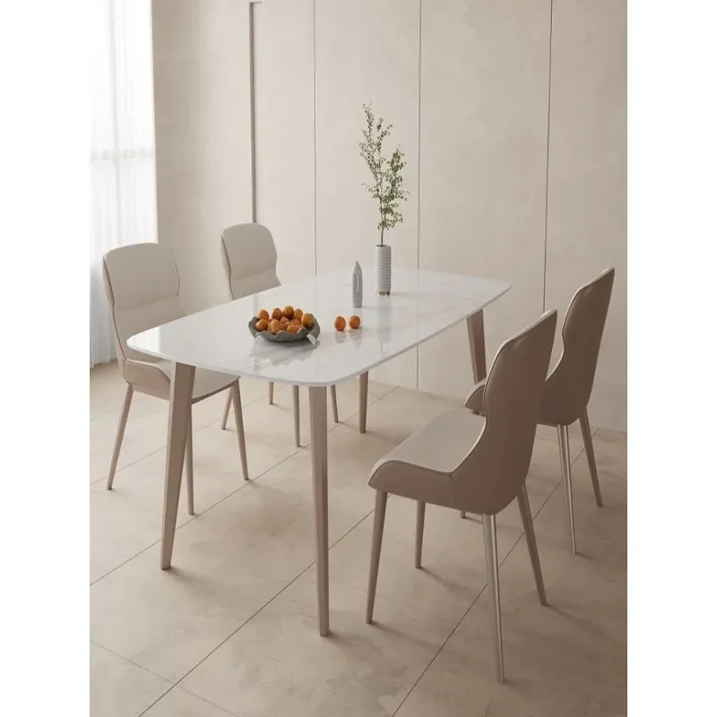 Italian light luxury Foshan rock slab dining table and chair combination household small apartment rectangular modern