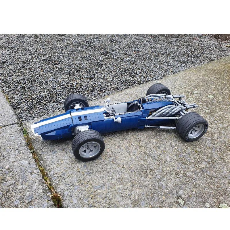 

Конструктор MOC-1234: Классический гоночный болид Формулы 1990-х годов, масштаб 1:8, 1521 деталь. Креативный подарок на день рождения для мальчиков и детей.