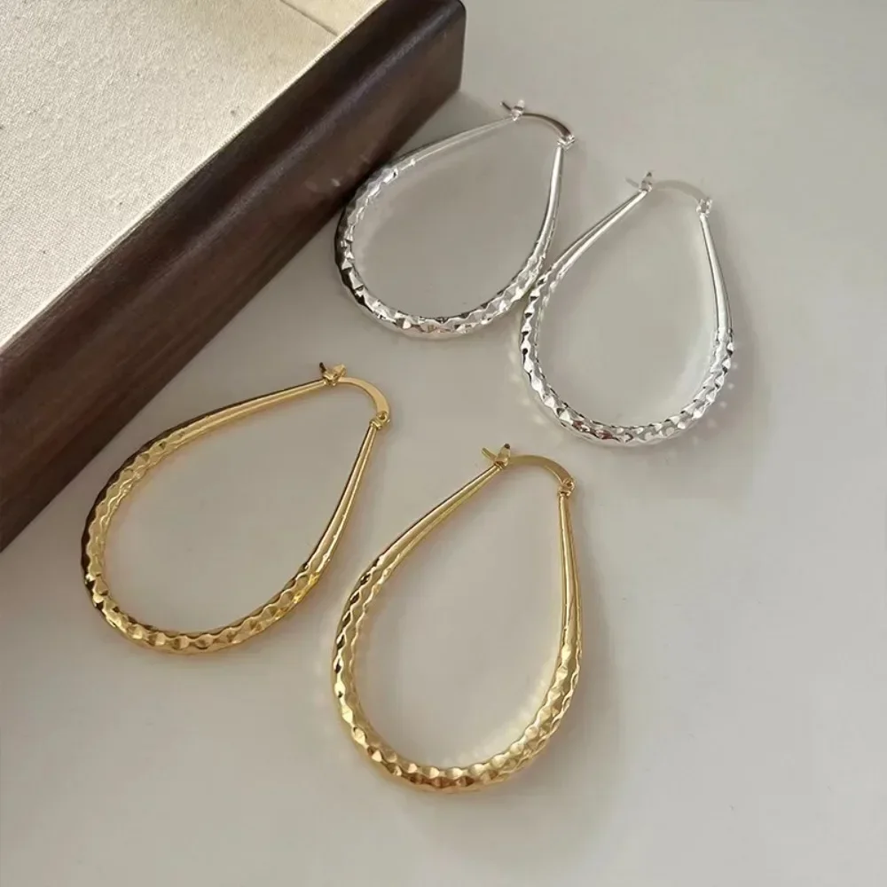 Hong Kong-style exaggerated diamond-shaped ripple water drop earrings, simple and versatile earrings for women