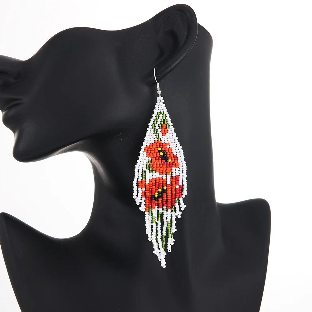 

Богемные разноцветные серьги из бисера с кисточками, сотканные вручную из сплава в национальном стиле, простой оригинальный дизайн, серьги с цветком и рисом