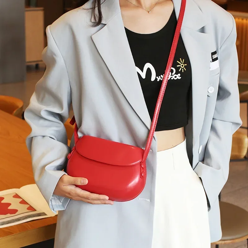 New crossbody saddle bag, retro versatile, solid color pressed shell bag, PU leather trendy fashion casual women's shoulder bag