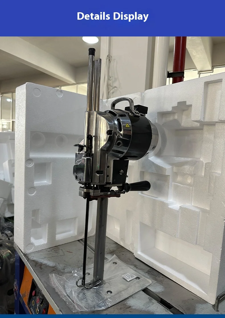 Automatic straight knife scissors vertical electricgarment cutting machine.Cuttingcapacity:880 watts.Voltage:220volts.High speed