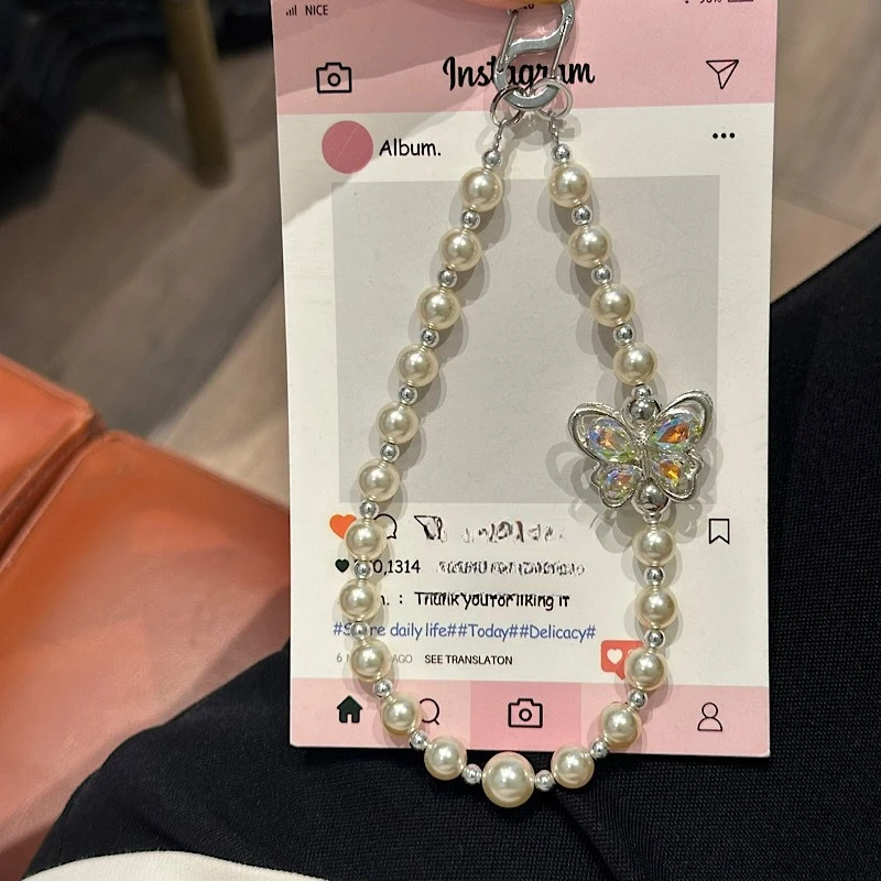 

Light Luxury Pearl Phone Chain Boutique Short Beaded Pendant Universal Accessories Jewelry Anti-Lost Pendant Luxury Phone Chain