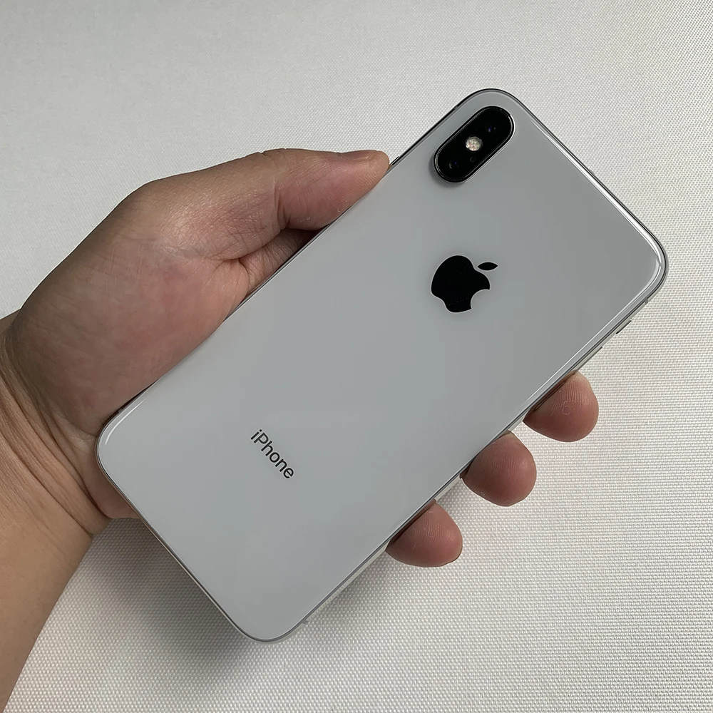 Original desbloqueado iPhone X 4G teléfono móvil ID facial 3GB RAM 64GB/256GB ROM OLED 5,8 "12MP + 7MP A11 Bionic Hexa Core IOS SmartPhone