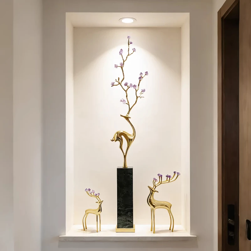 

Slender copper deer ornament, amethyst ornament next to the TV cabinet in the living room