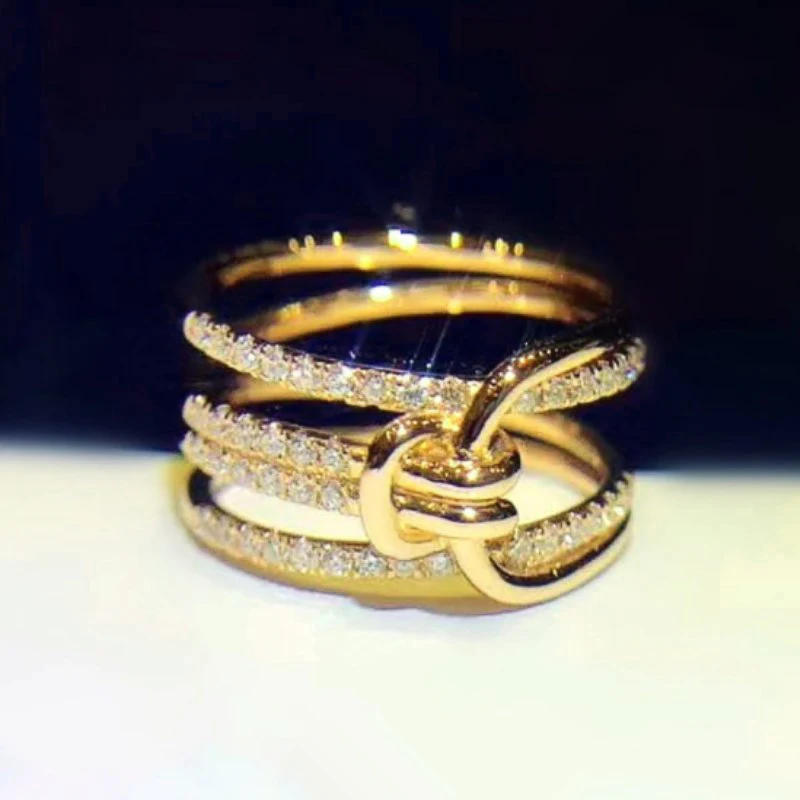 Huitan New Cross Design Gold Color Rings dla kobiet Luksusowe obrączki ślubne z cyrkoniami sześciennymi Biżuteria imprezowa
