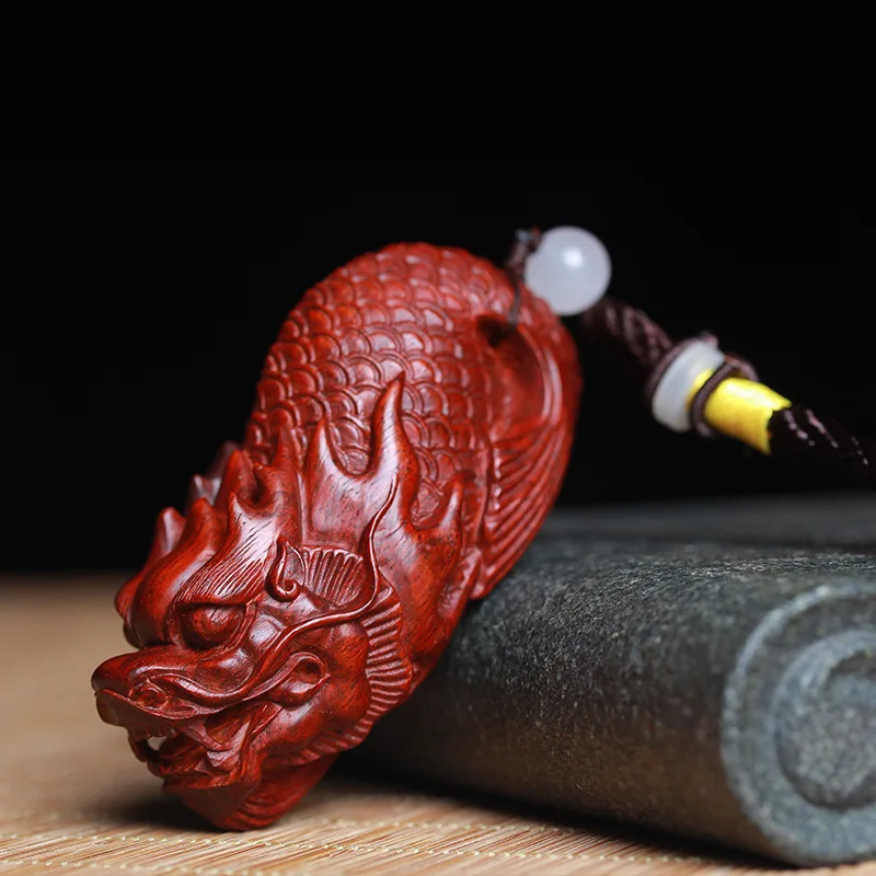 

Fidelity Indian small leaf red sandalwood carved dragon fish handle piece handle piece men carry on pendant mahogany sandalwood